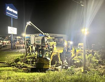 Crews worked all afternoon and late into Sunday night as they attempted to connect the damaged South Sheridan and Little Creek water association lines to Sheridan's water lines.