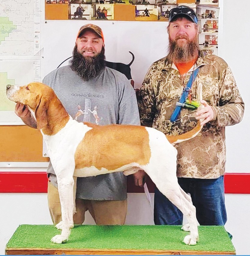 David Gilbert (right) recently joined the United English Breeders and Fanciers Association and will soon be headed to compete in English Days. Also pictured are Jarrod Washburn and his dog, Trigger.
