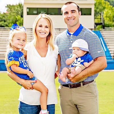 Tyler Turner has been named head football coach for the Yellowjackets. He’s pictured here with his wife, Amanda, and children Kennedy and Cross.