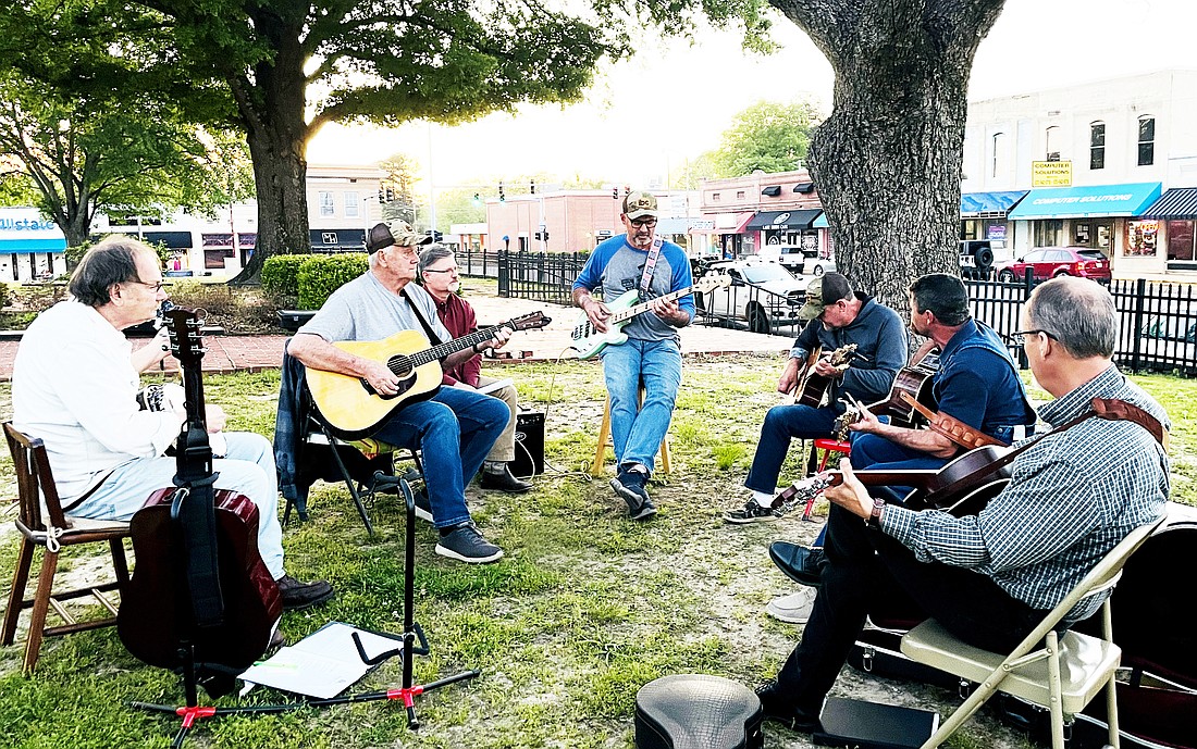 A group of local musicians invites all musicians to join them for jam sessions on the Grant County Courthouse lawn every Monday evening beginning at 5 p.m. The group would like for the jam sessions at the courthouse to become a regular event, citing they would like it to grow into a “mini-Mountain View” style event. On Saturday, May 13 the local Farmer’s Market will open near the courthouse and the musicians will be playing live on the courthouse lawn. Spectators are always welcome to join!  Photo By Gretchen Ritchie