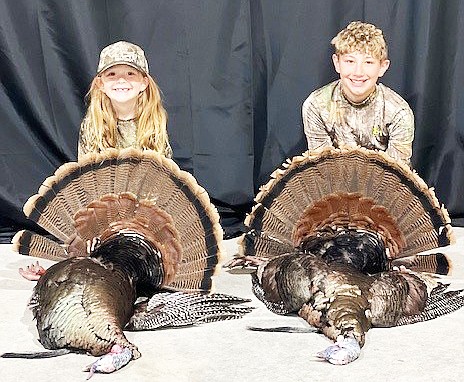 Briley Bridges, 6, (right) and Braden Bridges, 12, daughter and son of Brad and Donna Bridges, bagged themeselves a turkey each on the opening day of youth season while hunting with their dad in Grant County.