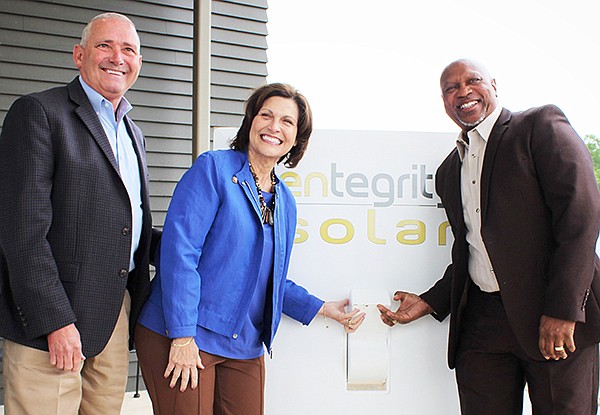 (L to R) White Hall Mayor Noel Foster, Stone Bank CEO Marnie Oldner, Jefferson County Judge Gerald Robinson flipped the switch on the interconnection of Stone Bank’s 219-kW solar electric power generation plant.