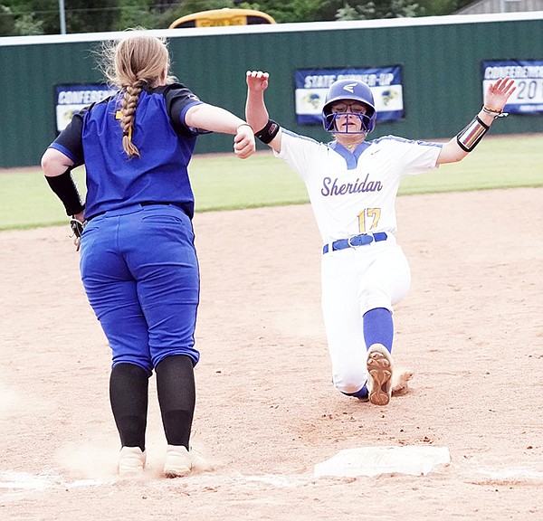 Sheridan’s Cooper Terry slides safely into third base during the Lady Jackets’ 14-0, five-inning rout of Hot Springs Lakeside at home on Thursday, May 4. 
Photo courtesy of Sheridan Schools Communications