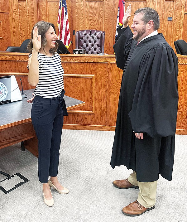 Clarissa Wallace is sworn in by Judge Stephen Shirron to the Sheridan School District Seat 6 position of the Sheridan School Board after receiving the winning vote last week. Photo by Gretchen Ritchey