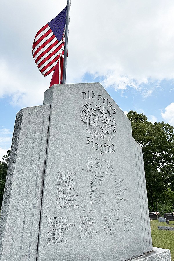 A monument in Ebenezer Cemetery commemorates Old Folks’ Singing and the founders. The 138th gathering of Old Folks Singing will be held at Ebenezer United Methodist Church in Tull on May 21. Photo By Brent Davis