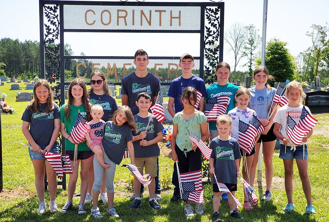 The Yellowjacket 4-H Club placed flags sponsored by the Cornith Cemetery Association on the graves of veterans at the cemetery in honor of Memorial Day last month.