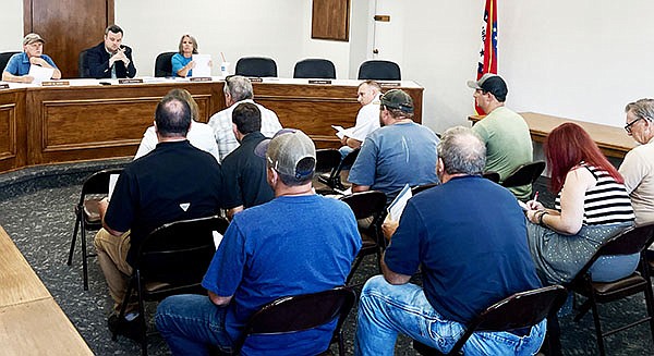 Sheridan Mayor Cain Nattin led a public meeting last week with Code Enforcement Officer Scott Warren to discuss a proposed ordinance on permit fees. The public was invited to attend and address any concerns or questions. Photo By Gretchen Ritchey