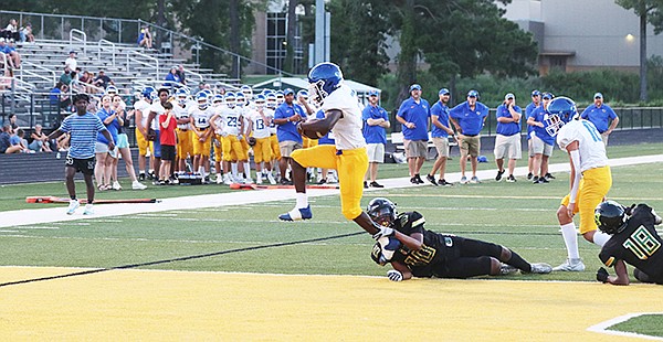 Sheridan’s Isaiah Stephens steps over the defense for a touchdown in a game earlier this season. Through three games this year, Stephens has rushed for 12 touchdown. Photo by Charlie Kinser