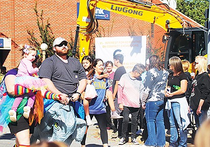 THE 40TH ANNUAL TIMBERFEST drew large crowds throughout the two-day event with its 160 vendor booths, a parade, multiple entertainment stages, children’s activities, a BBQ cookout, the annual lumberjack competition and much more. 
Photo by Kadance Jacks