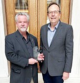 Arkansas Senator Alan Clark (R-Lonsdale, Dist. 13) (left) was recently presented with the Family Council Action Committee’s 2023 Statesman Award by Jerry Cox (right) with the FAC.
