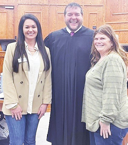 Jennica Clement (L) and Missy Overton (R) were recently sworn in by Circuit Judge Stephen Shirron as Grant County’s newest volunteers with CASA as court appointed special advocates.