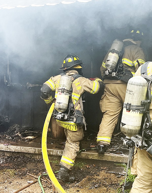 SHERIDAN FIREFIGHTERS saved part of a duplex, but the other side was a total loss.