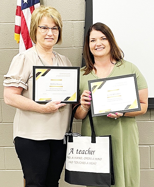 Debbie Bowen, (left) Sheridan Middle School teacher and Cindy Whitaker, (right) Sheridan Elementary School teacher were awarded Teacher of the Year at the Grant County Chamber of Commerce breakfast last week. (Not pictured) Coach Ally Simmons from East End Elementary School also received Teacher of the Year. Photo by Gretchen Ritchey