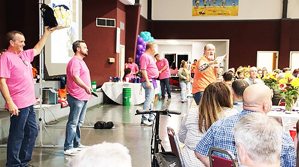 THE NEW BEGINNINGS DINNER & AUCTION FUNDRAISER held Saturday, Jan. 25 at First Landmark Baptist Church in Sheridan was a success thanks to the generosity of sponsors, donors, participants and the many volunteers who made the event possible. Photo by Millie McClain