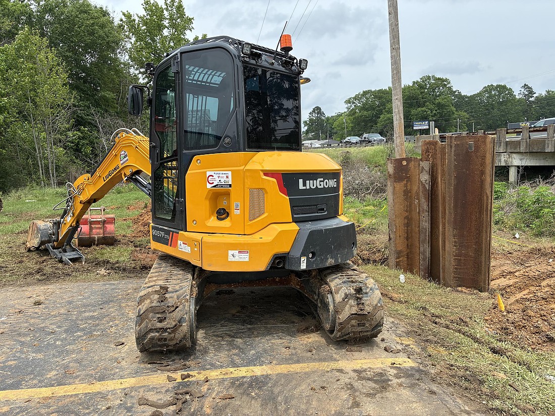 Heavy equipment stands at the ready shortly after crews tied Sheridan’s water lines to the lines belonging to the South Sheridan Water Association. (Photo: Byron Tate)