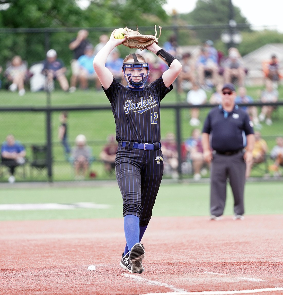 Chloe Clark winds up for a pitch. (Photo: Andy Mayberry, Sheridan School District)