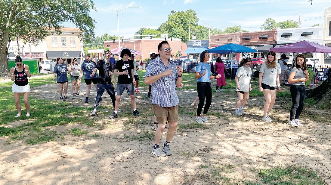 Cutline: Patrons enjoy getting into the music with dance moves at the Health Fair at the Grant County Courthouse on June 28, during the Downtown Sheridan Farmer’s Market. (Photo Gretchen Richey)