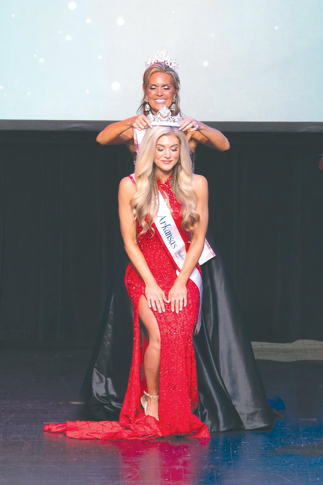 Cameron Willis Steele being crowned 2025 Mrs. Arkansas America by 2024 Mrs. Arkansas America Brandy Tarini. (Photo: Jerry R. Davis Photography)