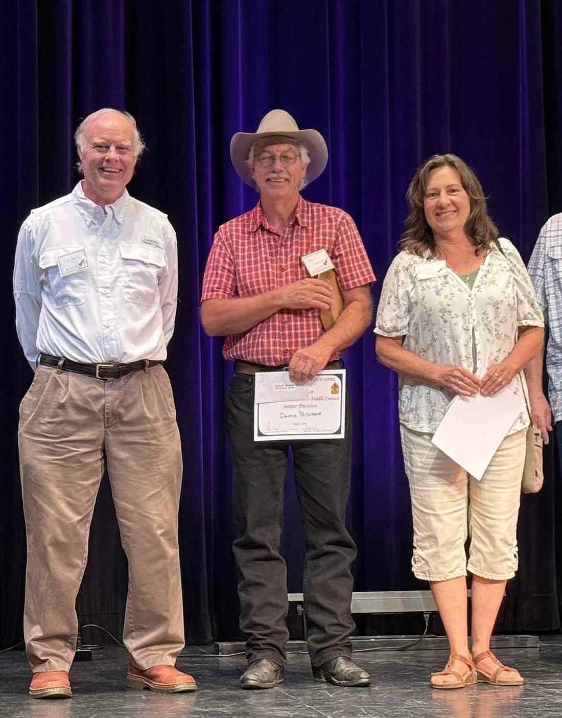 Pictured left to right:  Winners of 2025 Senior Division Fiddle Championship: Third Place-Tim Trawick, Greenbrier; First Place- Dennis Pritchard, Reeds Spring, Mo.; Second Place- Judy Warner, Sheridan. (Photo: Judy Kaye Kent)