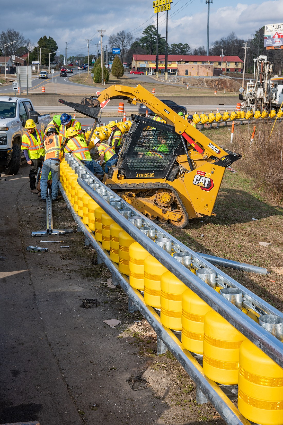 Workers are shown installing new safety rolling barriers in Benton. (Photo: Submitted)