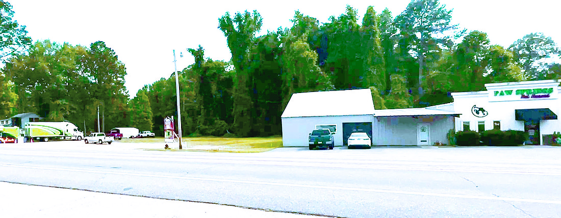 Paw Springs Cutline: Paw Springs Resort for pets is at the center of a land dispute for a continuance of a violation of the city's setback ordinance after building a structure too close to the property line. (Photo: Gretchen Ritchey)