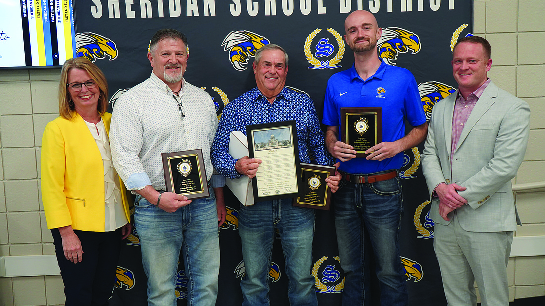 Three members of the Sheridan Board of Education have concluded their service to the district and were honored at the monthly school board meeting, including one who has served almost three decades. Pictured left to right: State Rep. Julie Mayberry, Sheridan School Board members Stan Hancock, Jody Spann, and Jacob Palmer, and Superintendent Chad Pitts. (Sheridan School District photo)