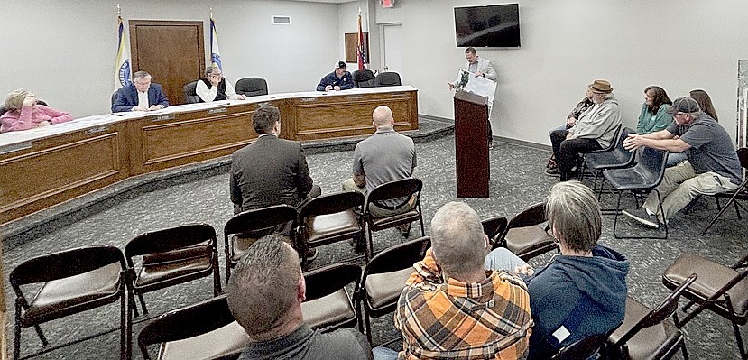Sheridan School District Superintendent Chad Pitts show a rendering of the proposed covered
open-air pavilion at a variance hearing last Tuesday. The school district asked for a variance to
move the building closer to the property line.