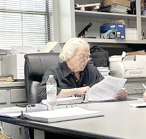 RUSTY HAWKINS

South Sheridan Water Association Board President Rusty Hawkins looks at paperwork during last Monday’s monthly SSWA meeting. 

Photo by Gretchen Ritchey