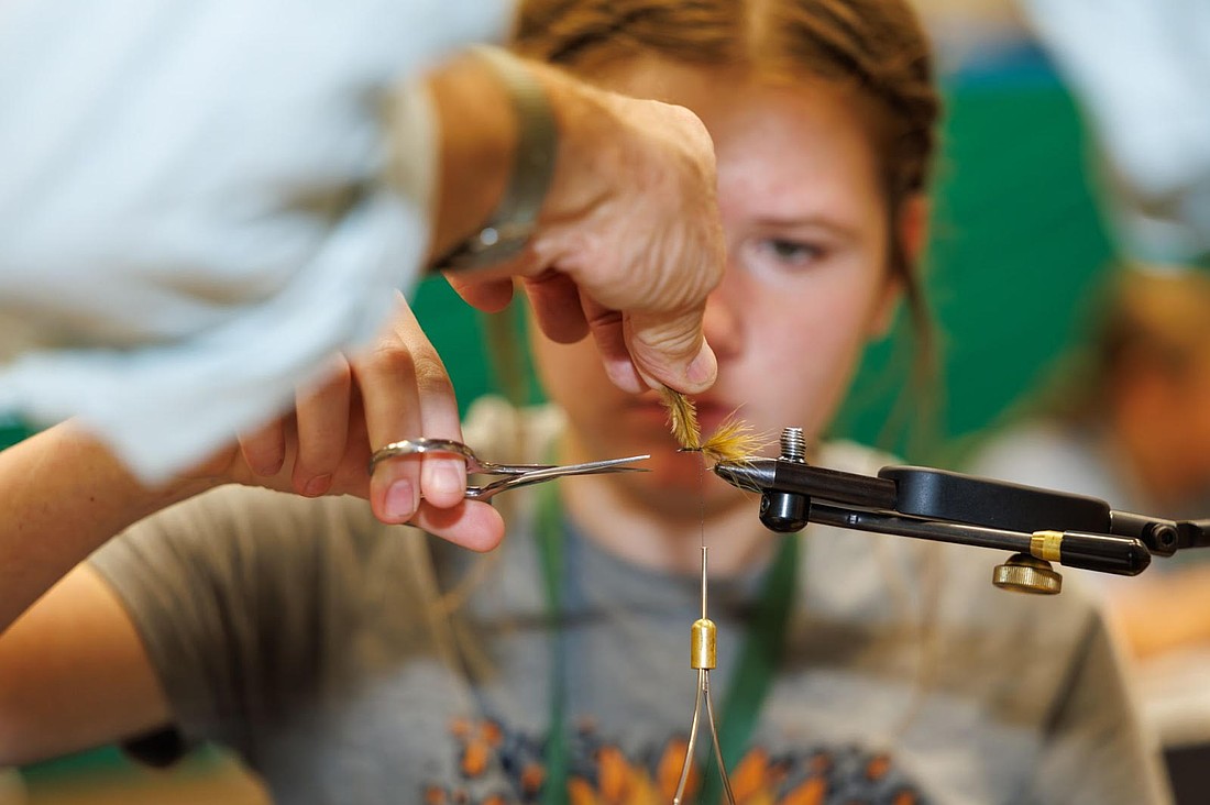 Students were immersed in all sorts of outdoor-oriented activities, such as fly-tying, when they were not engaged in conservation-focused competitions. AGFC photo.